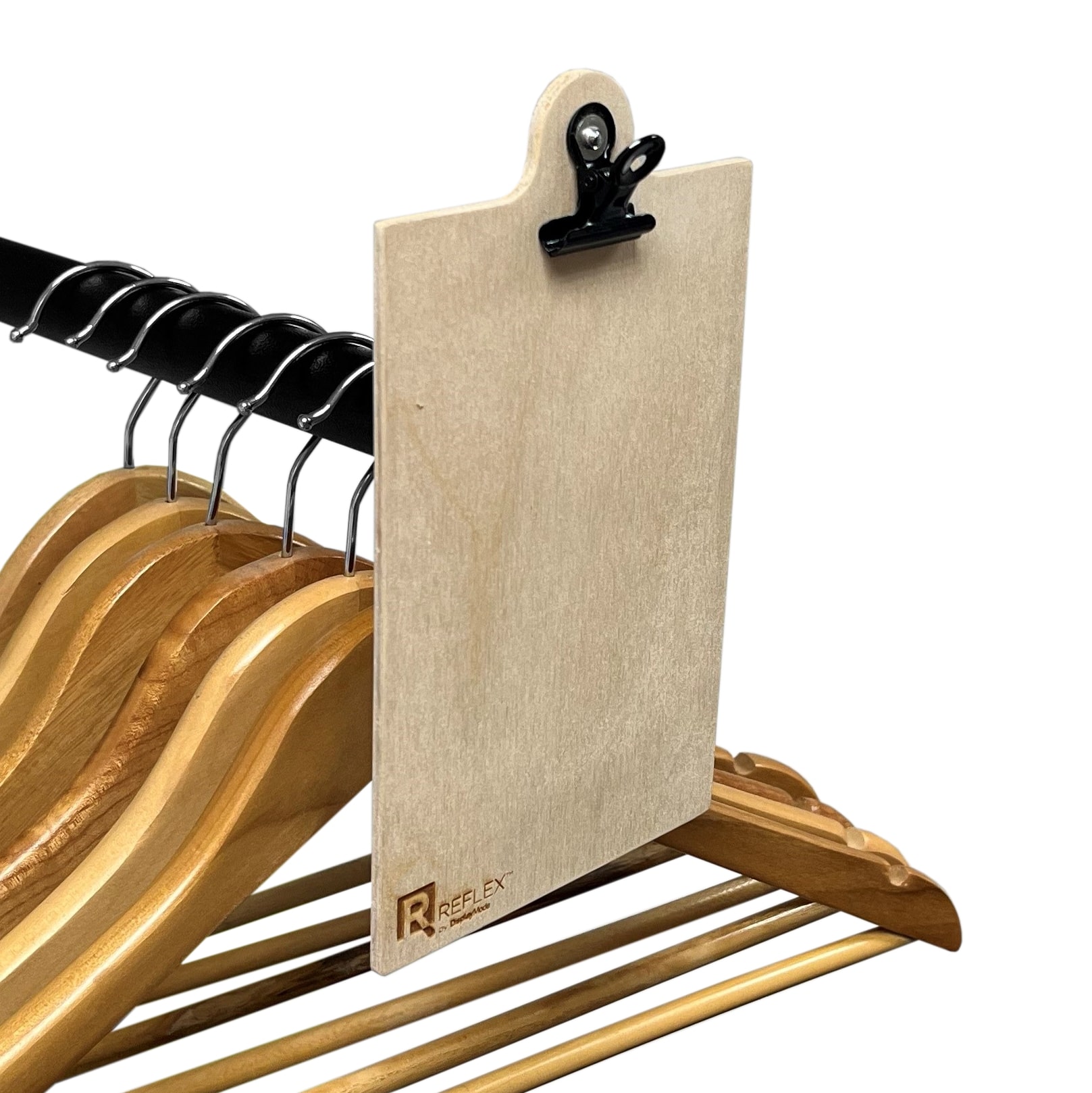 Etched plywood clipboard on clothes rail